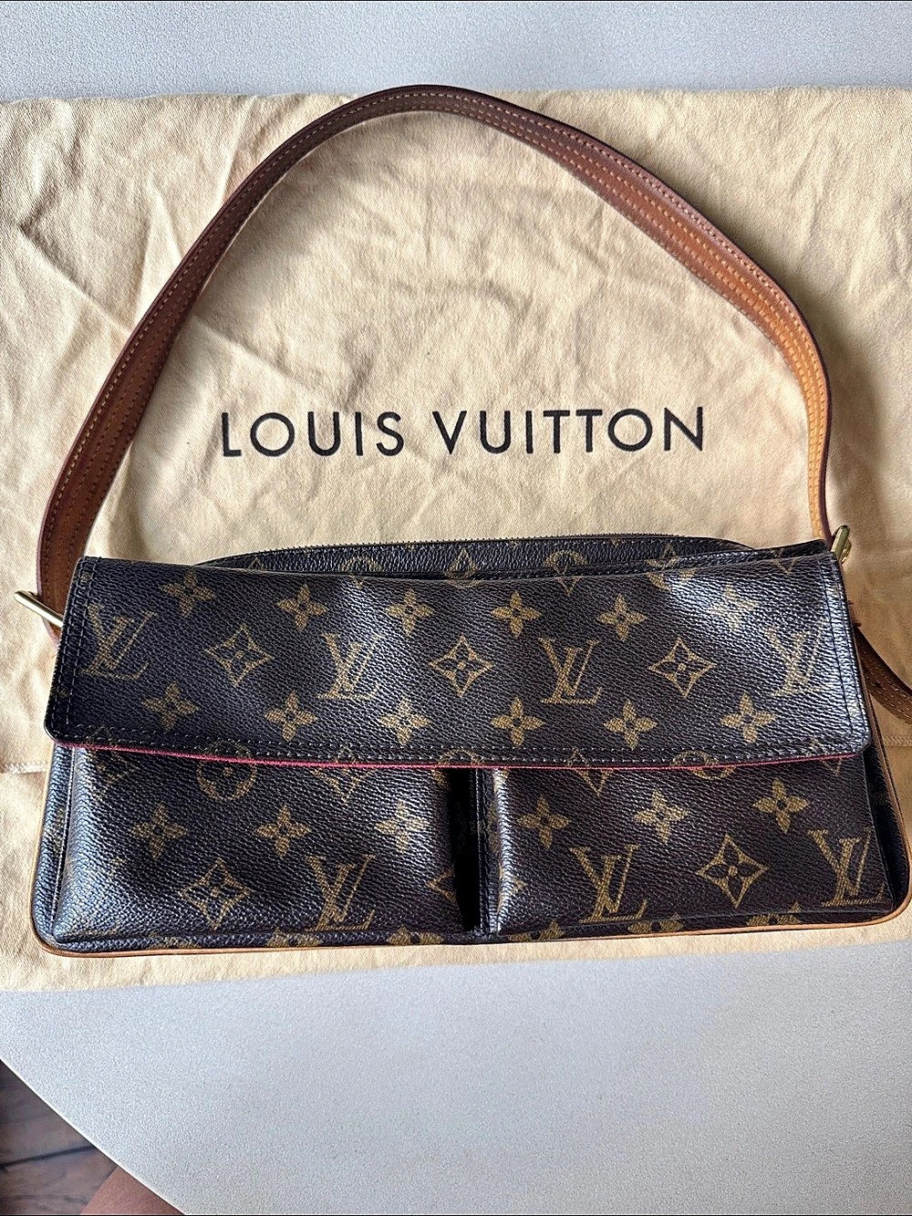 Louis Vuitton Monogram Cité MM Monogram Leather Crossbody Bag, Brown